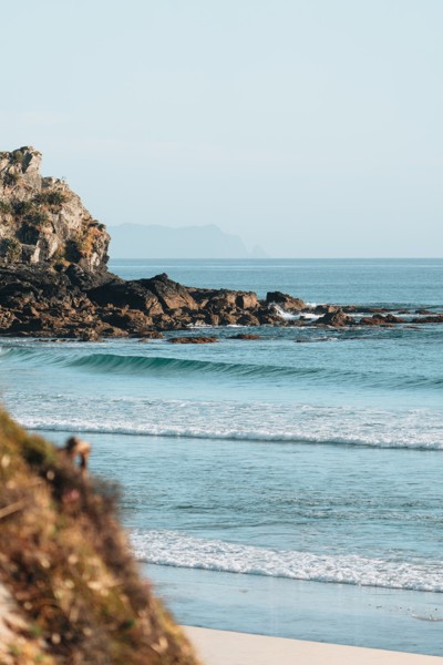 Waves along a rocky coastal cove